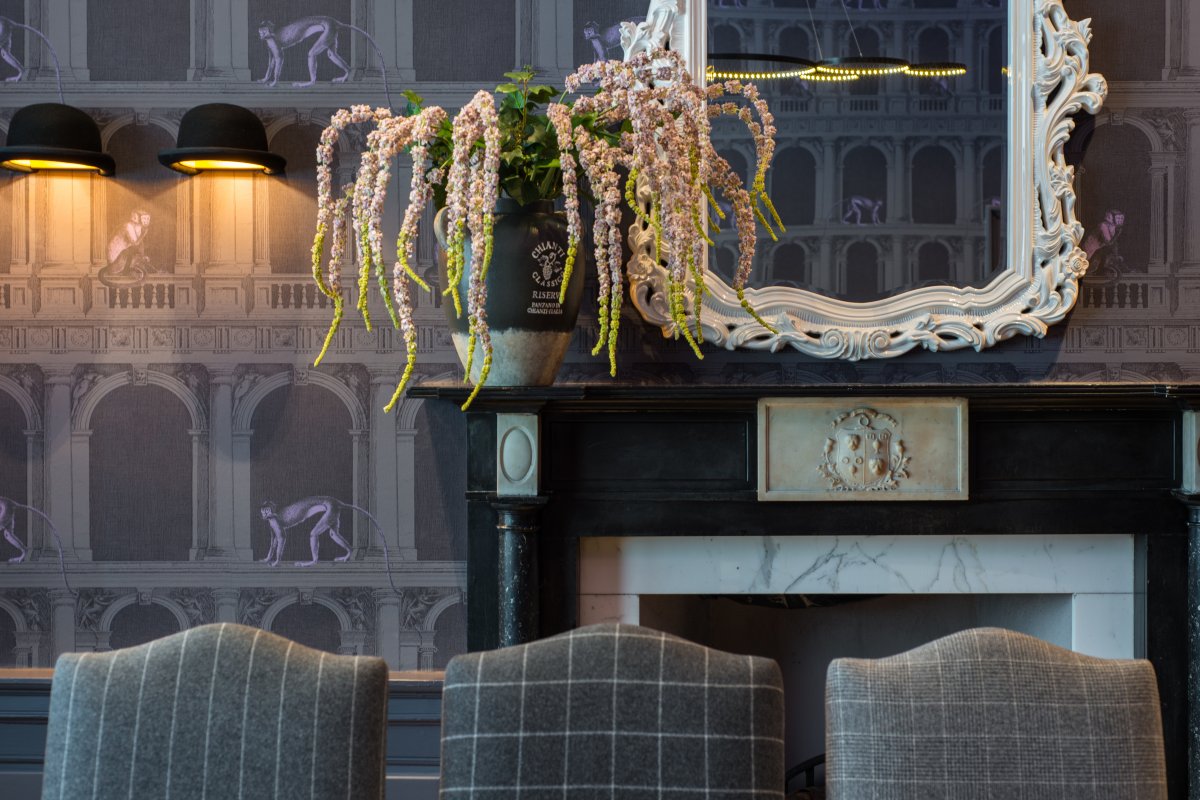 Elegant meeting space at The Skyhook, featuring floral decor for networking events.