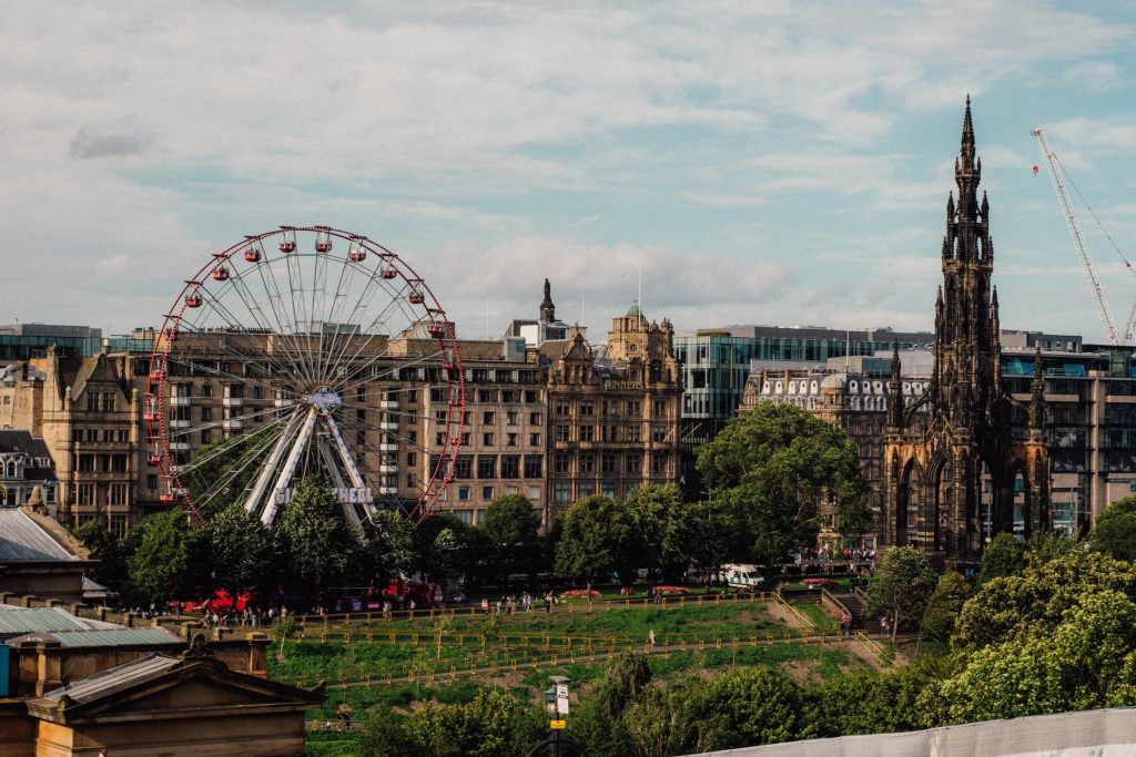 Haymarket Hub Hotel cityscape with Ferris wheel, perfect for events and gatherings.