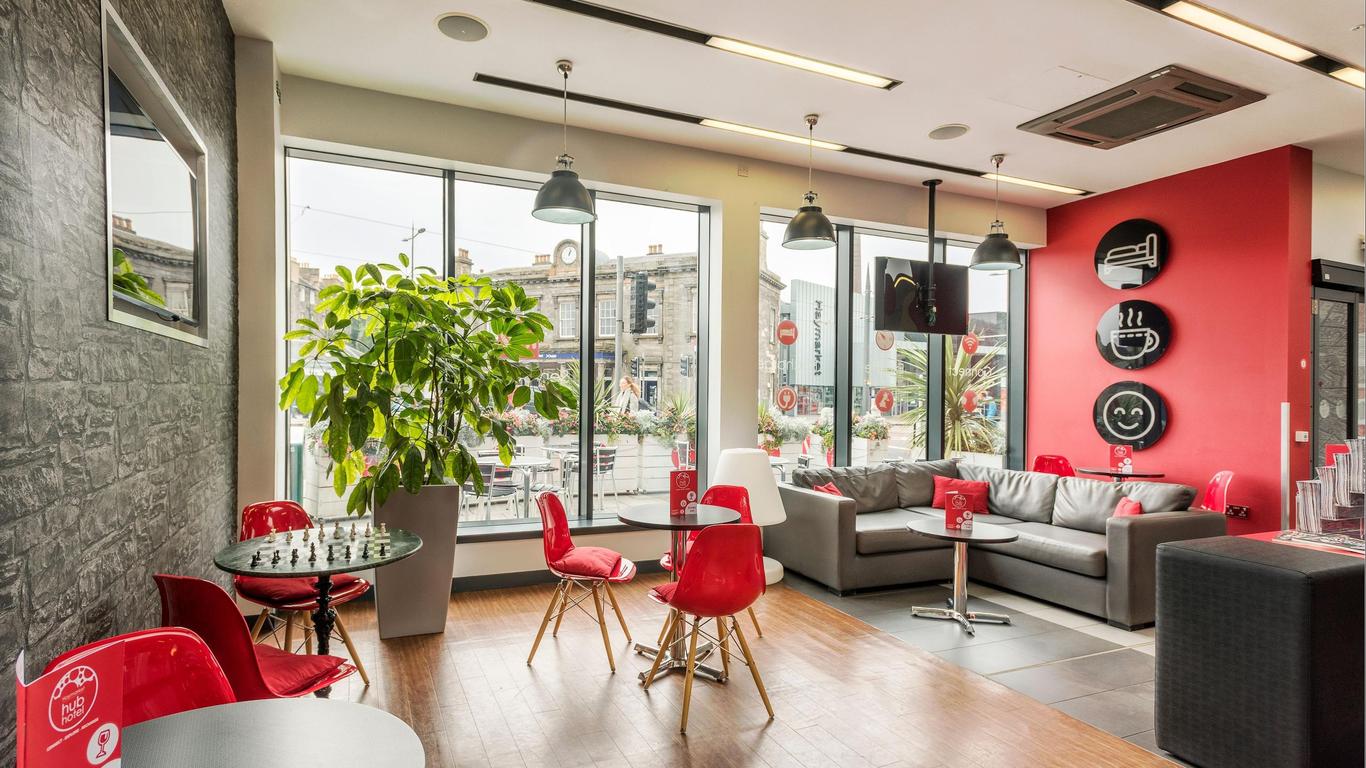 Modern lounge area at Haymarket Hub Hotel for networking events and meetings.