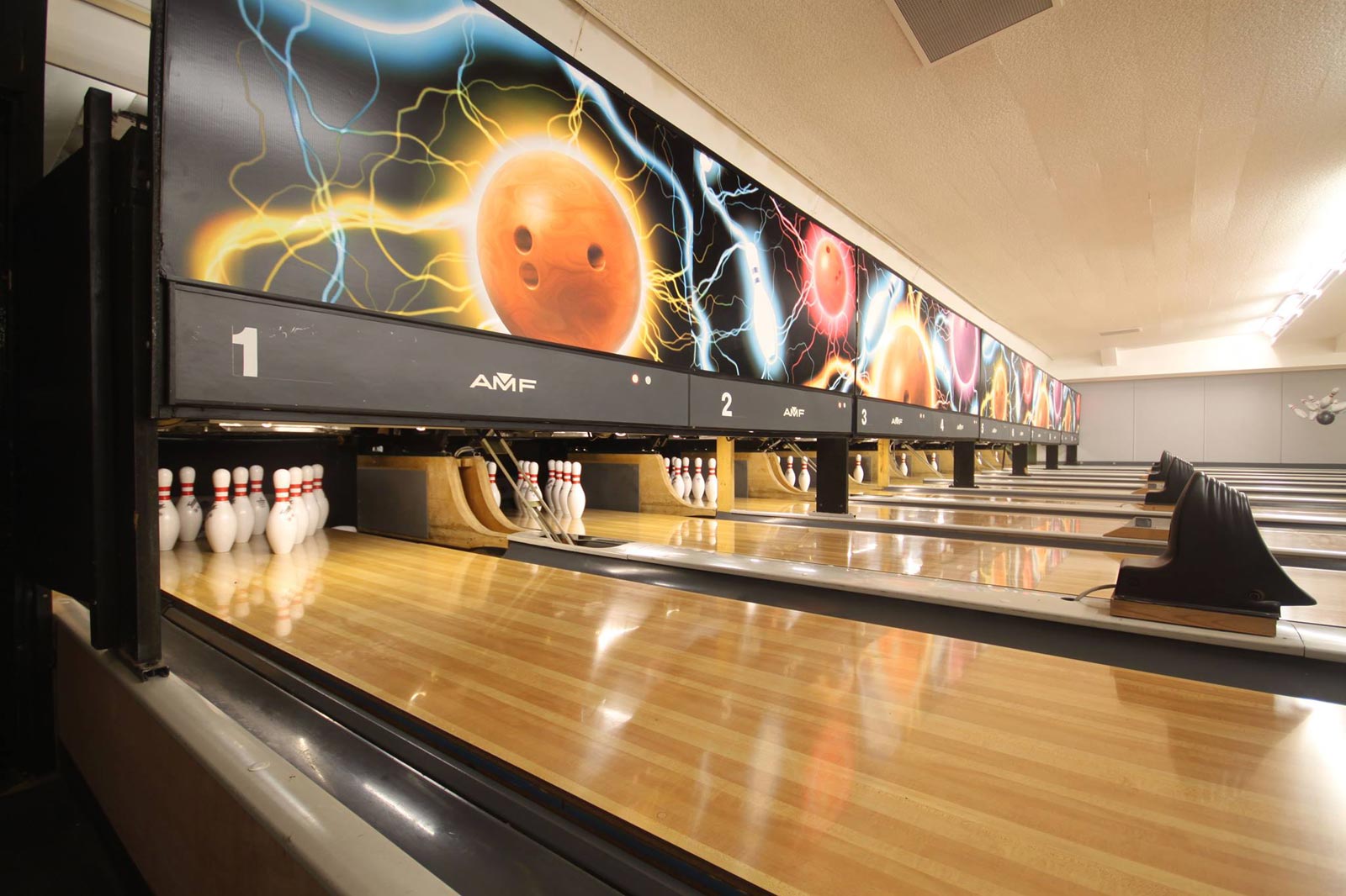 Vibrant bowling alley at Murrayfield Indoor Sports Club for corporate events and team-building.