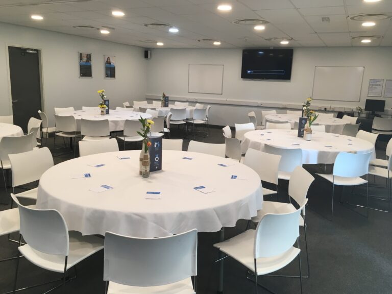 Modern conference suite at Hopwood Hall College, perfect for workshops and networking.