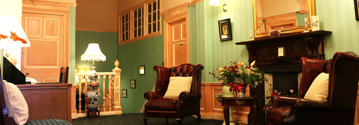 Cozy classic meeting room at Grosvenor Gardens Hotel, perfect for networking events.