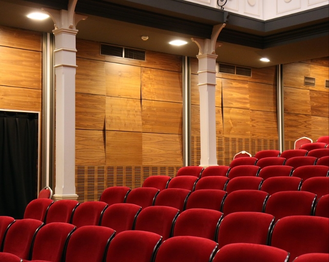 Main Auditorium at Carnegie Hall with plush red seating for performances and presentations.