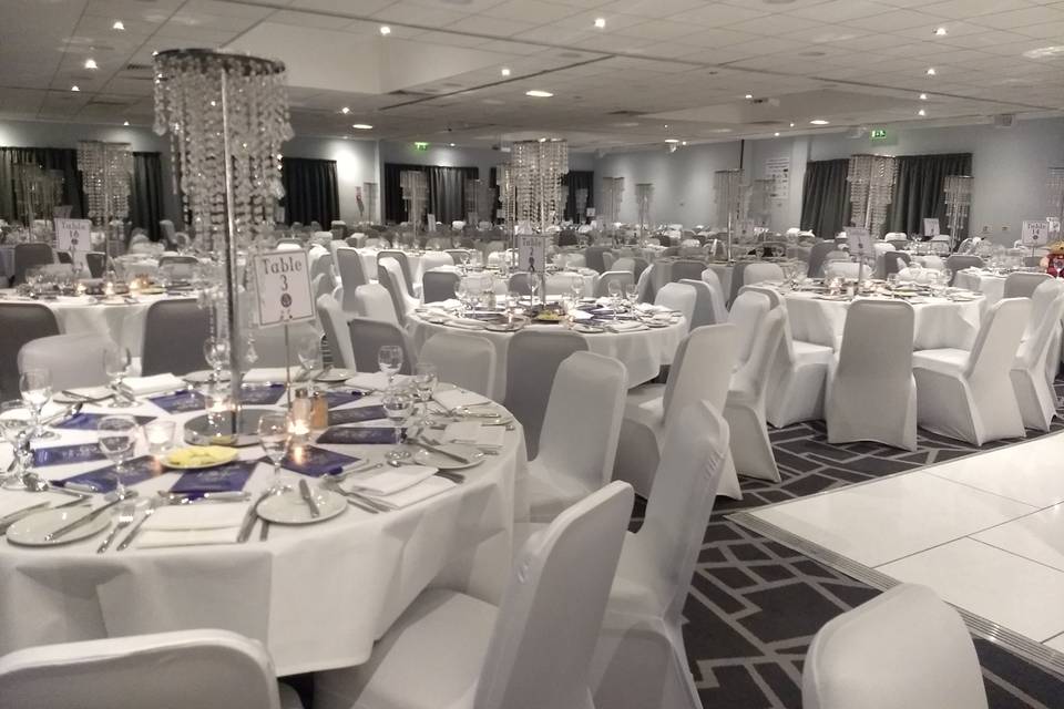 Elegant banquet setup in Village Hotel Bury's Main Space for formal events.