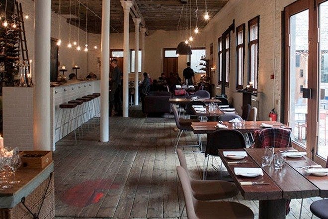 Stylish open-concept dining space at The Shed, perfect for gatherings and events.