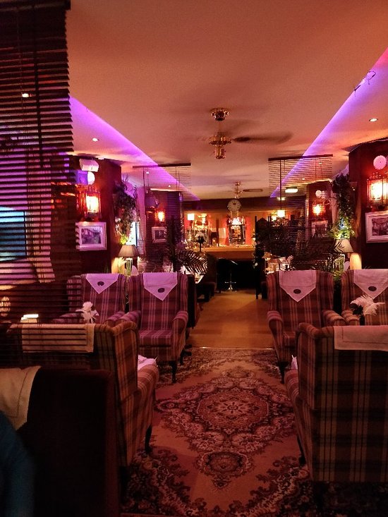 Queen Charlotte Suite: stylish venue with plush seating for upscale meetings and events.