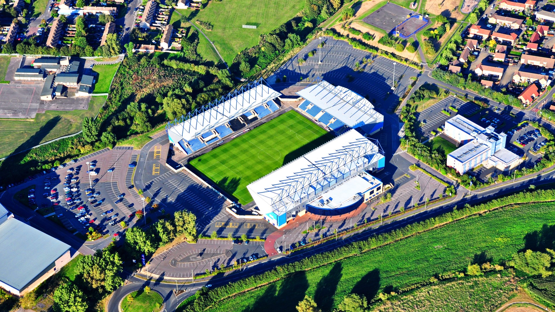 Modern Kassam Stadium Exhibition Hall, ideal for events with ample parking and green spaces.