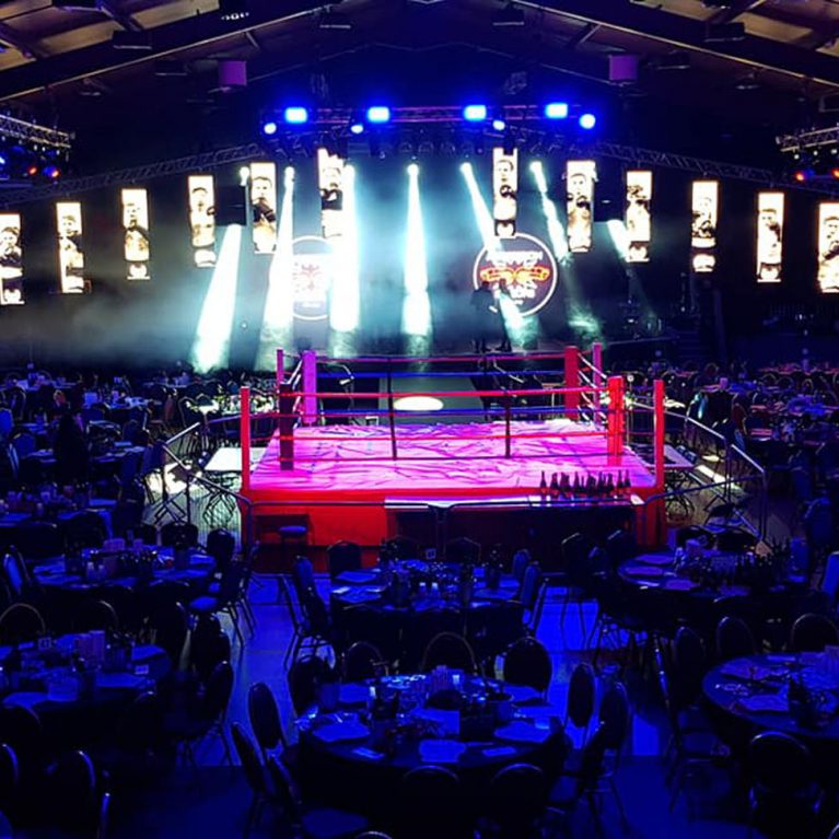 Boxing ring at Rainton Arena for a dynamic gala event with elegant table setup.