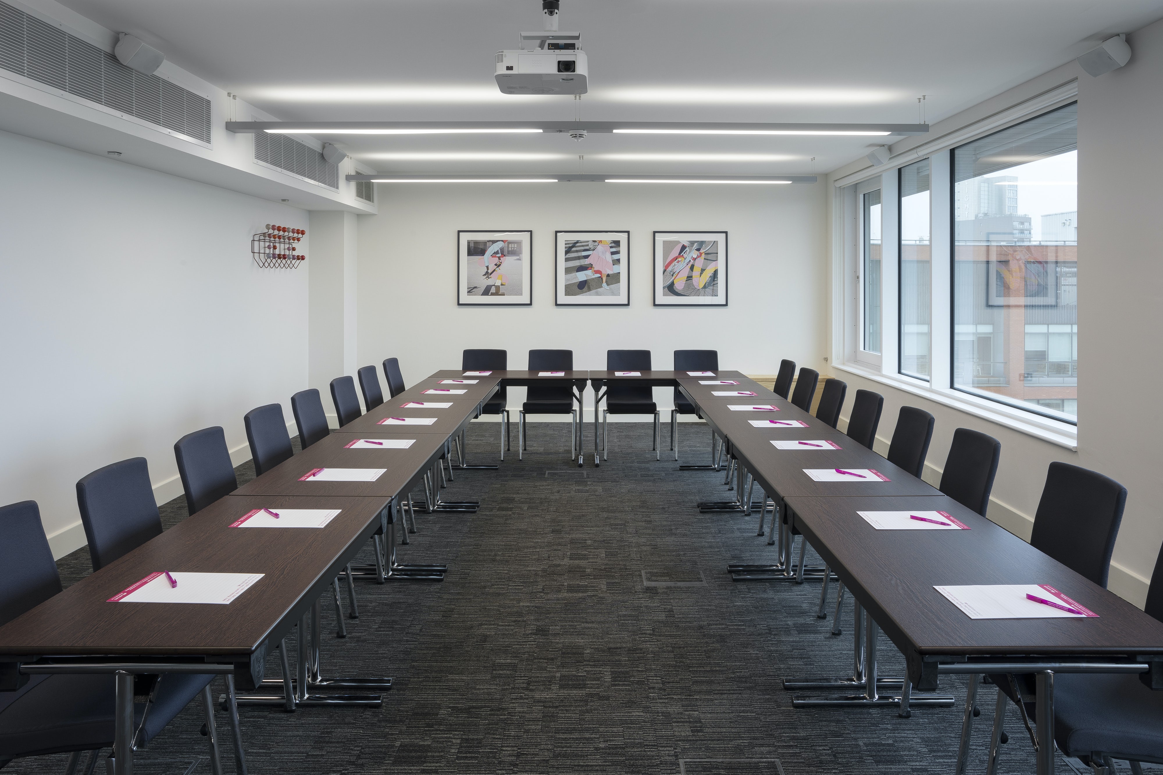 U-shaped meeting room in Etc.venues Manchester, ideal for conferences and presentations.