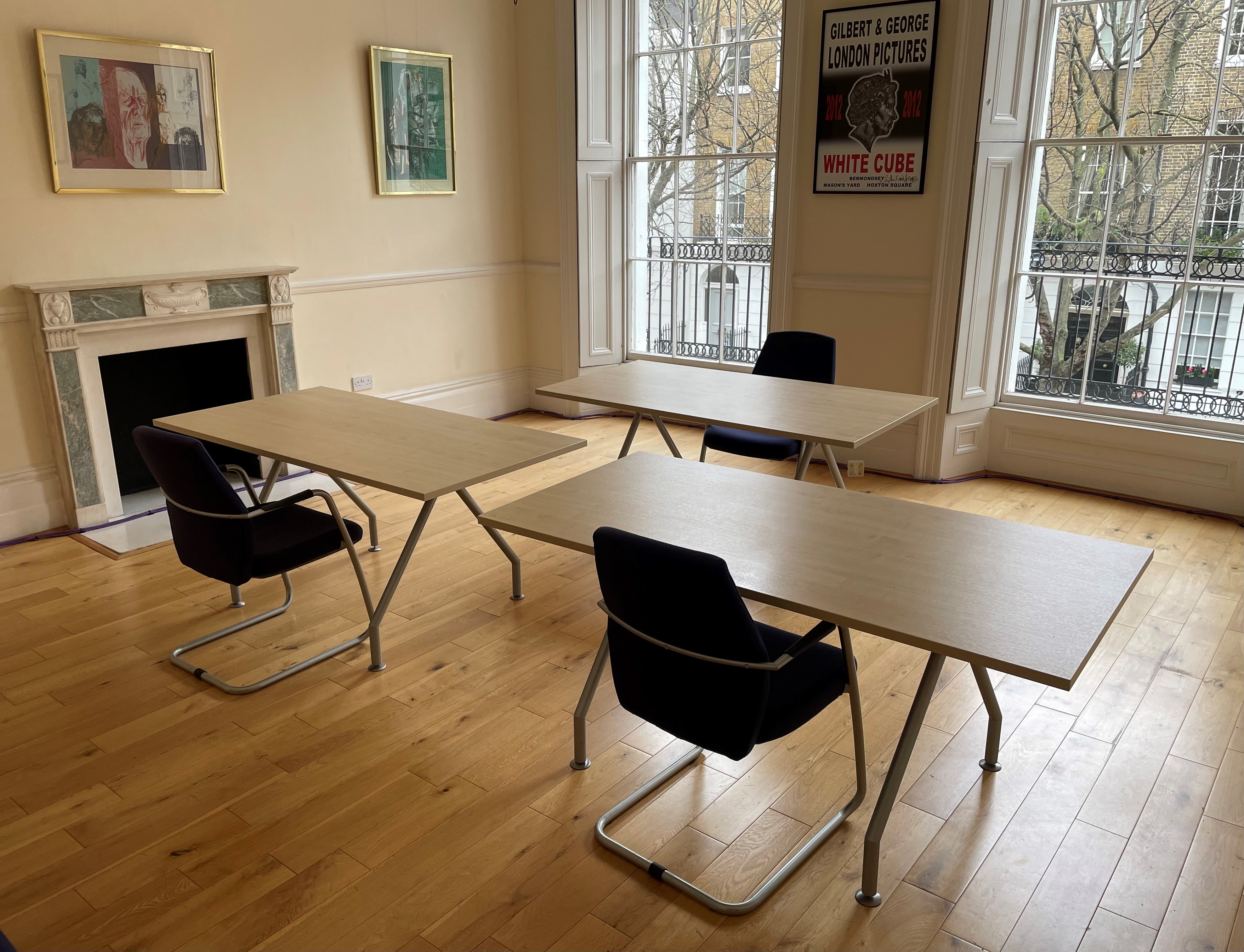 Versatile meeting room with natural light, ideal for workshops in historic Bloomsbury.