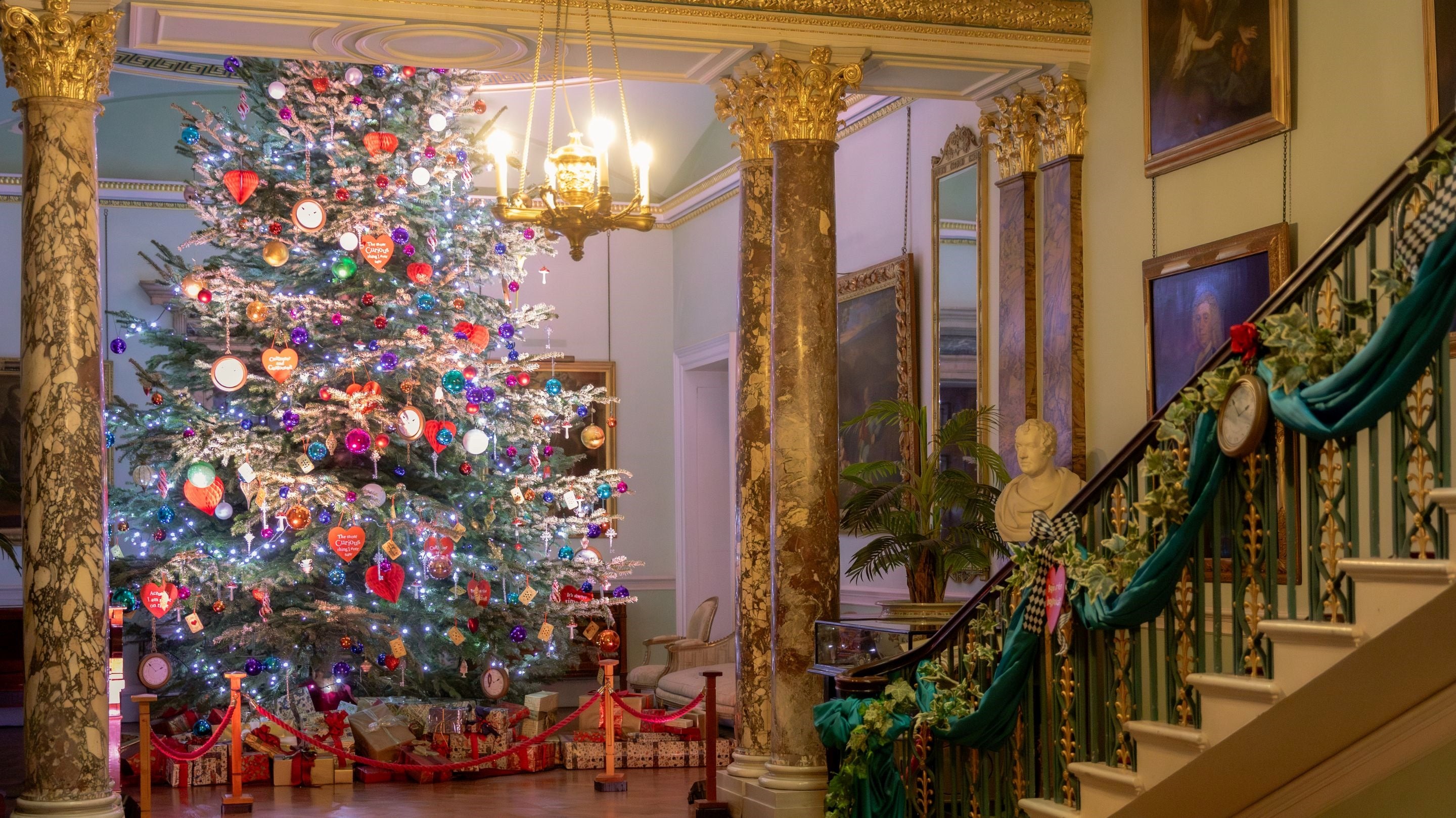 "Tenants' Hall in Tatton Park with grand Christmas tree, perfect for holiday events."