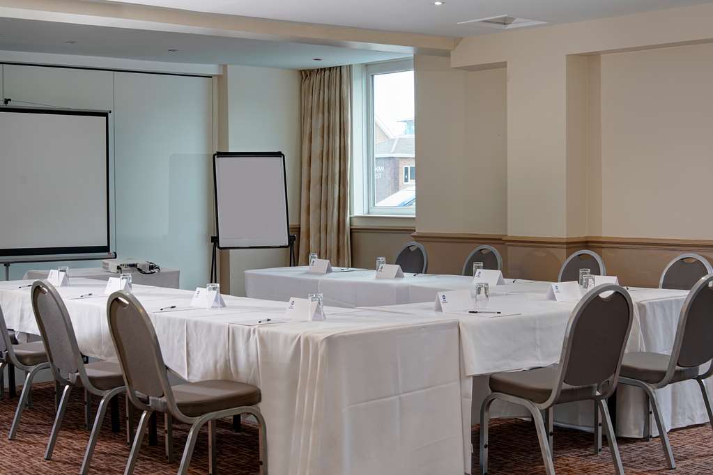 Executive Boardroom at Cresta Court Hotel, U-shaped table setup for professional meetings.