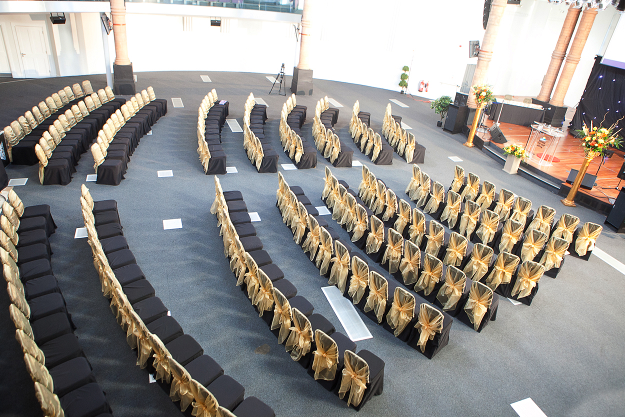 Diamond Arena event space with elegant chairs, perfect for weddings and conferences.