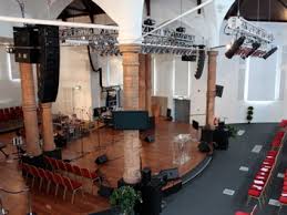 Diamond Arena stage with seating, ideal for conferences and concerts.