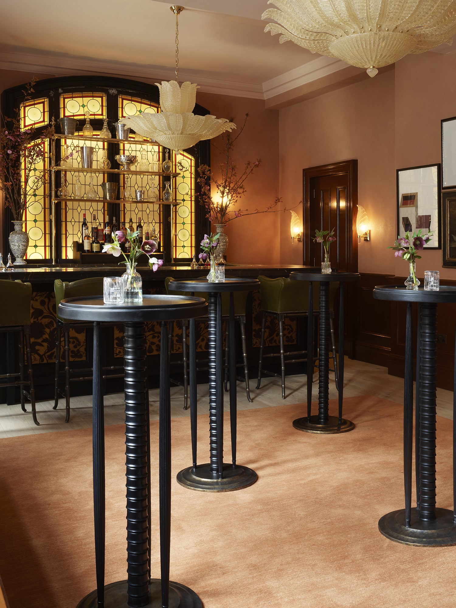 Sophisticated event space in The NoMad London with elegant floral arrangements.