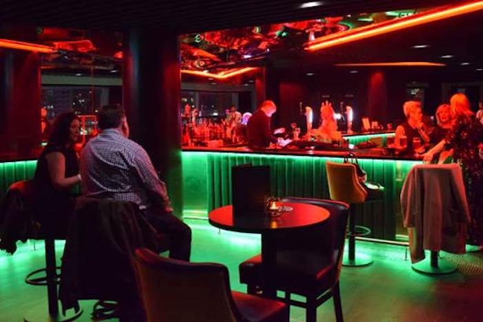 Heineken Sky Lounge at AO Arena: vibrant bar for networking and social events.