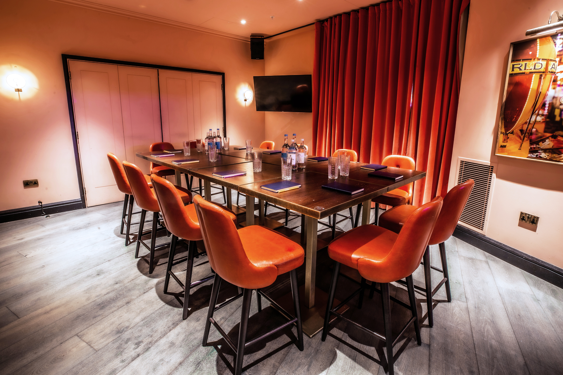 Stylish meeting room at Puttshack Bank for corporate events and brainstorming sessions.