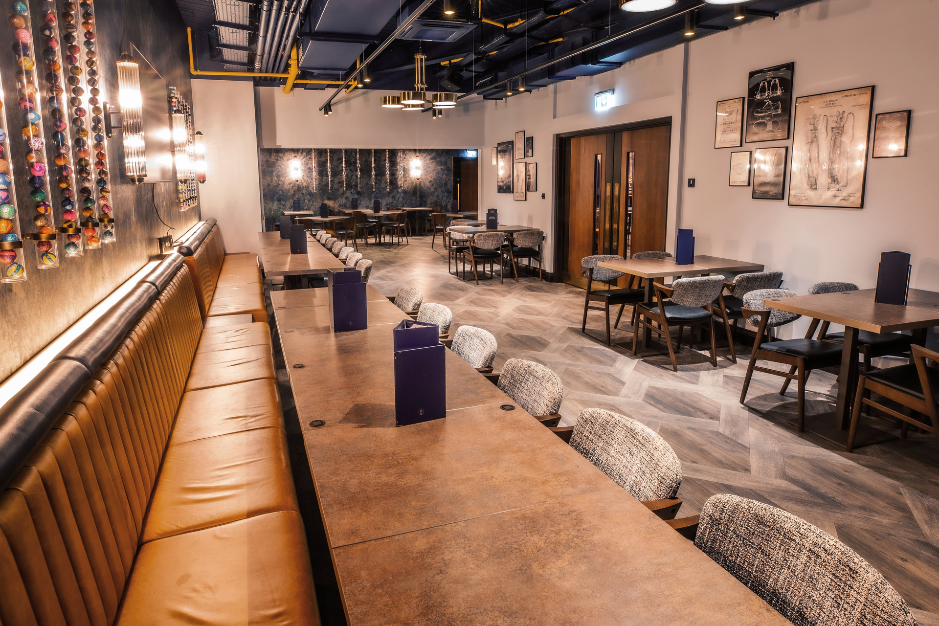 Exclusive venue hire in Puttshack Watford, featuring stylish decor for networking events.