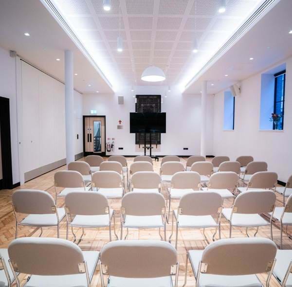 Modern meeting space at Wesleyan, bright design for workshops and presentations.