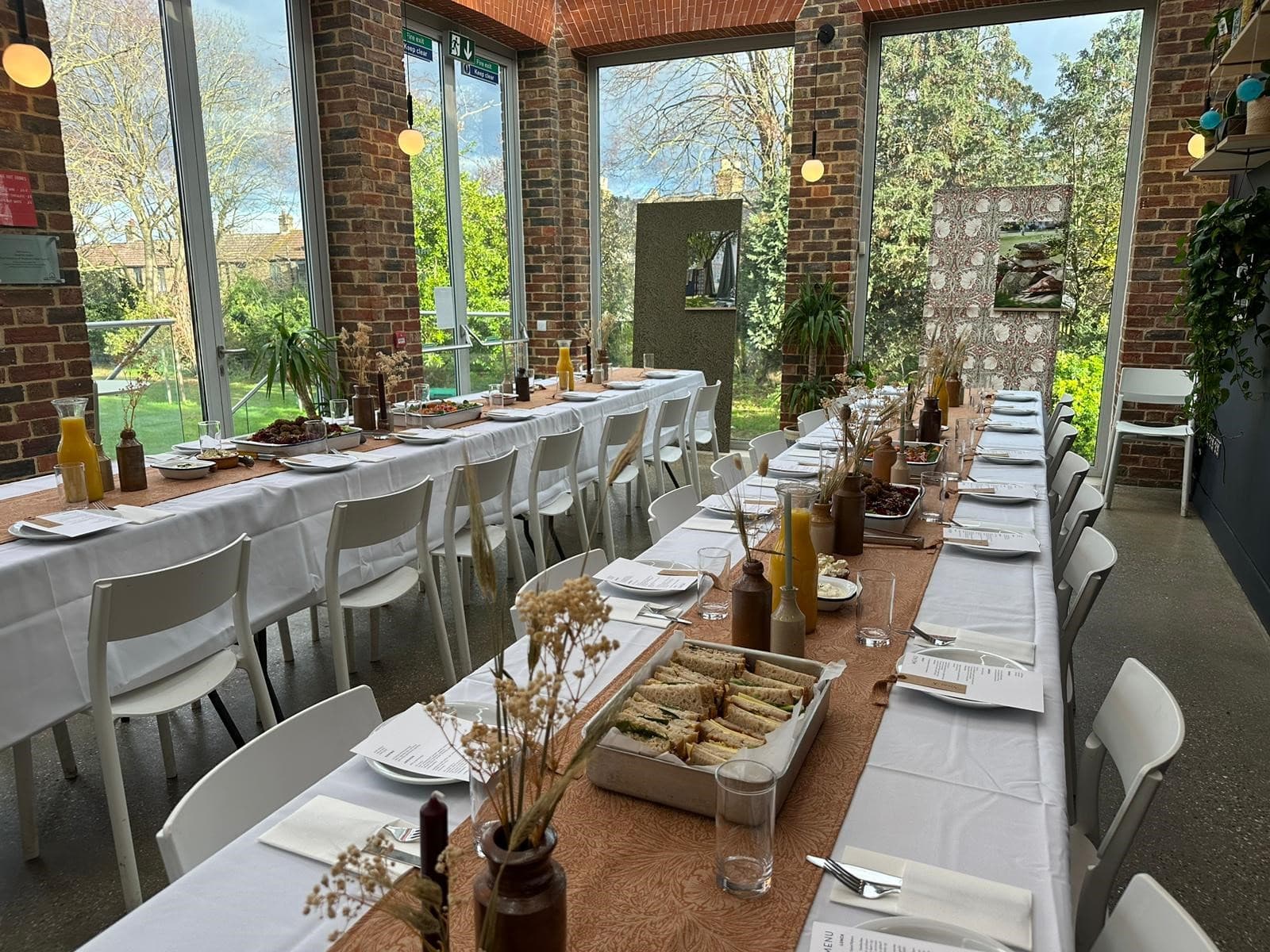 Exclusive use of William Morris Gallery dining setup for networking events, featuring elegant table.