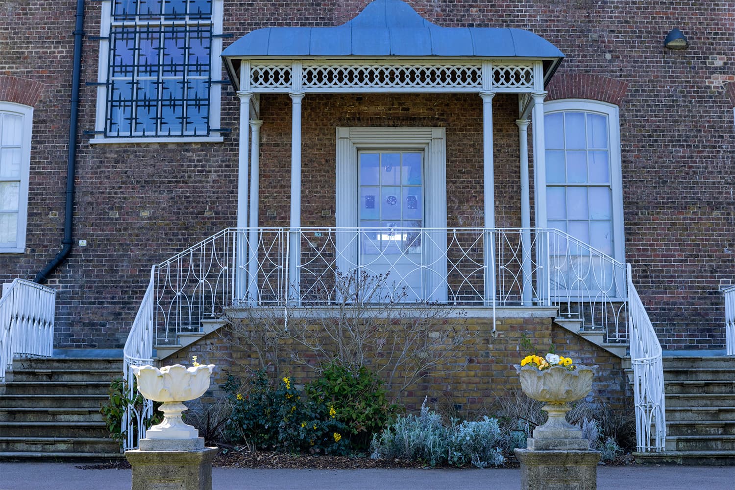 Glasshouse entrance at William Morris Gallery, ideal for outdoor events and gatherings.