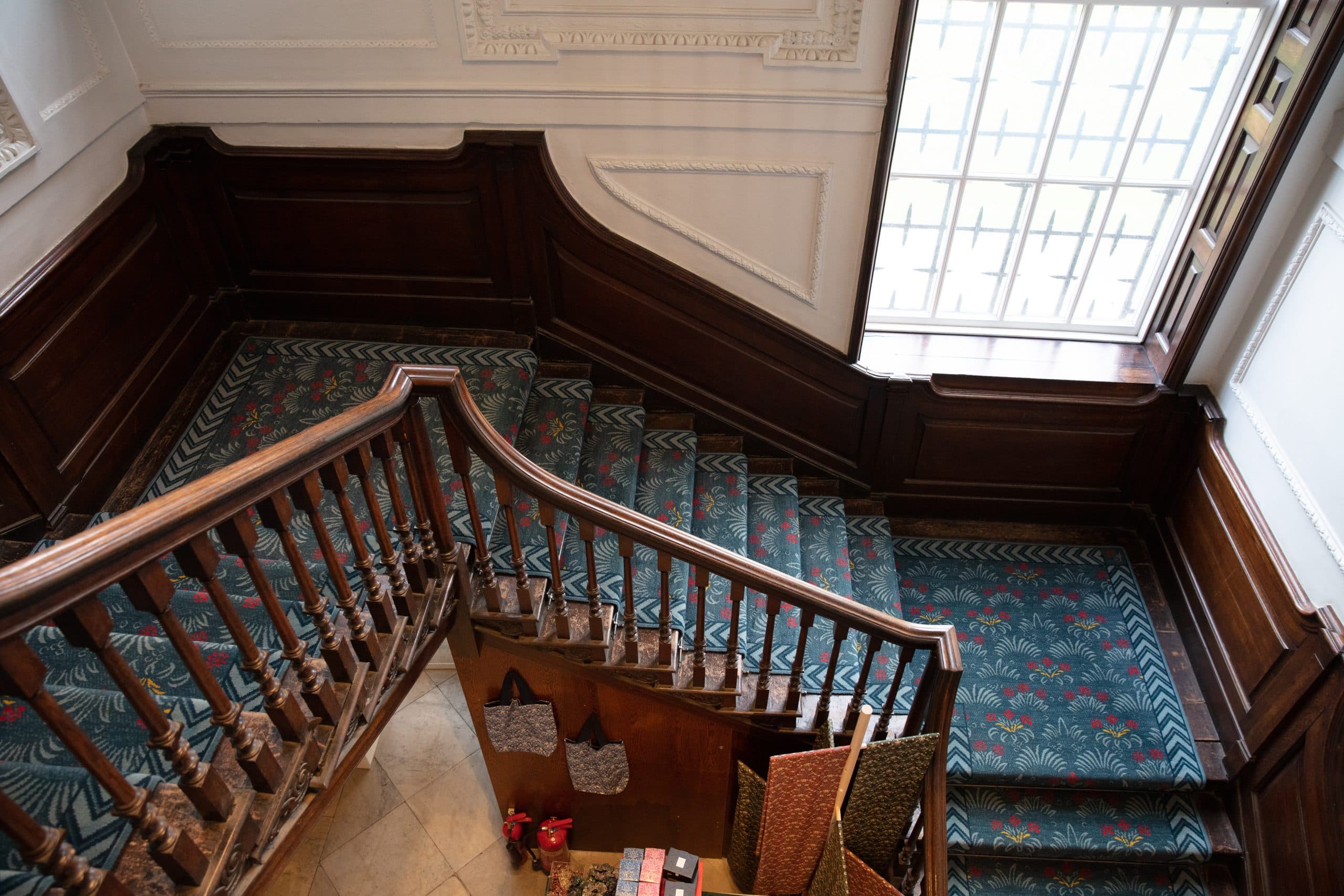 Elegant staircase at Story Lounge, perfect for events and networking.