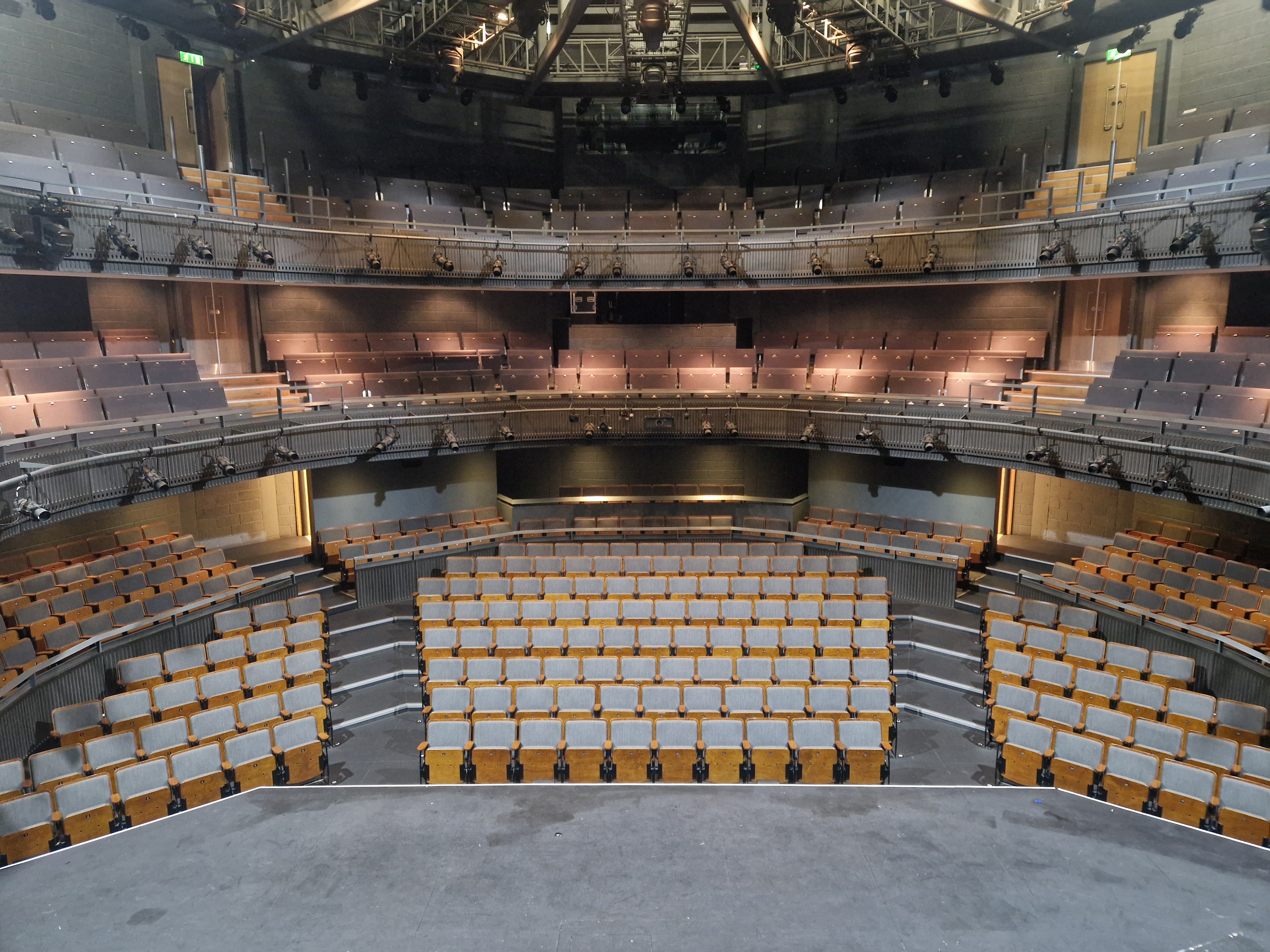 Main Auditorium in Rose Theatre with tiered seating, ideal for conferences and performances.