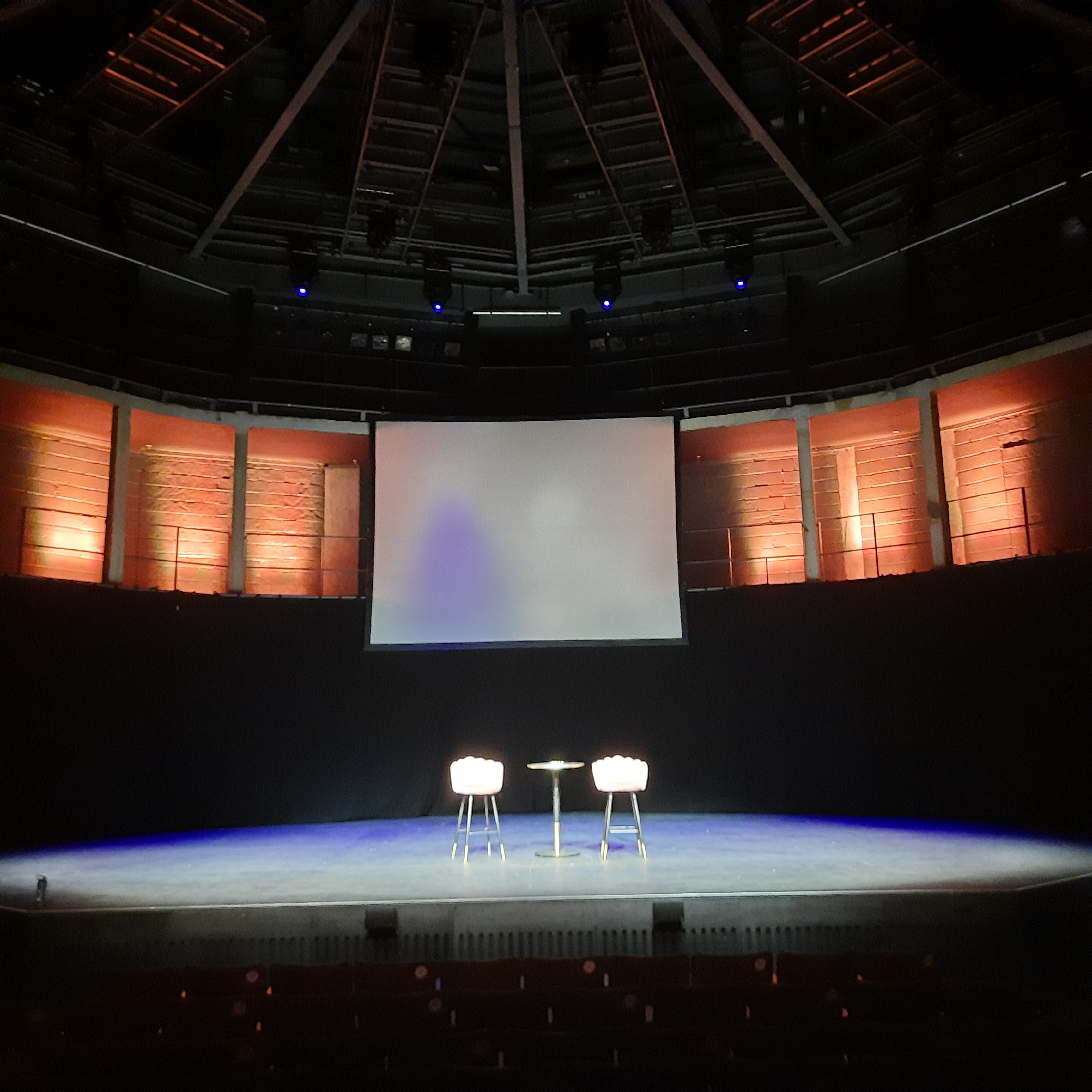 Sleek stage setup in Rose Theatre's Main Auditorium for engaging presentations and discussions.