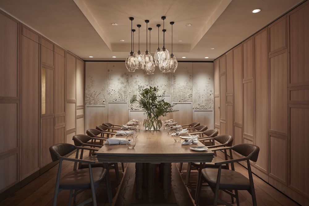 Private dining room at The Meat & Wine Co. with elegant decor for exclusive events.