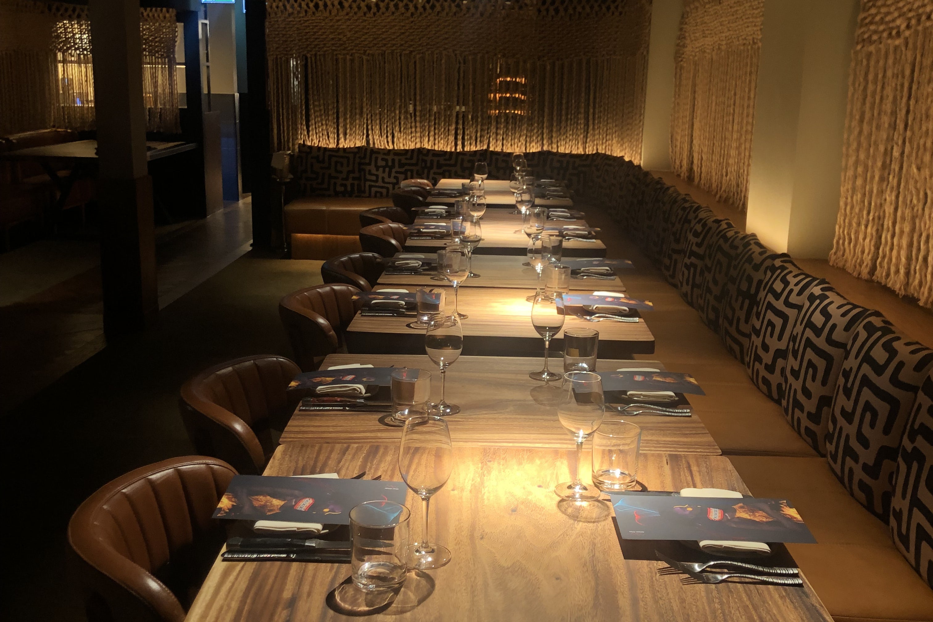 Private dining room at The Meat & Wine Co. with elegant decor for corporate dinners.