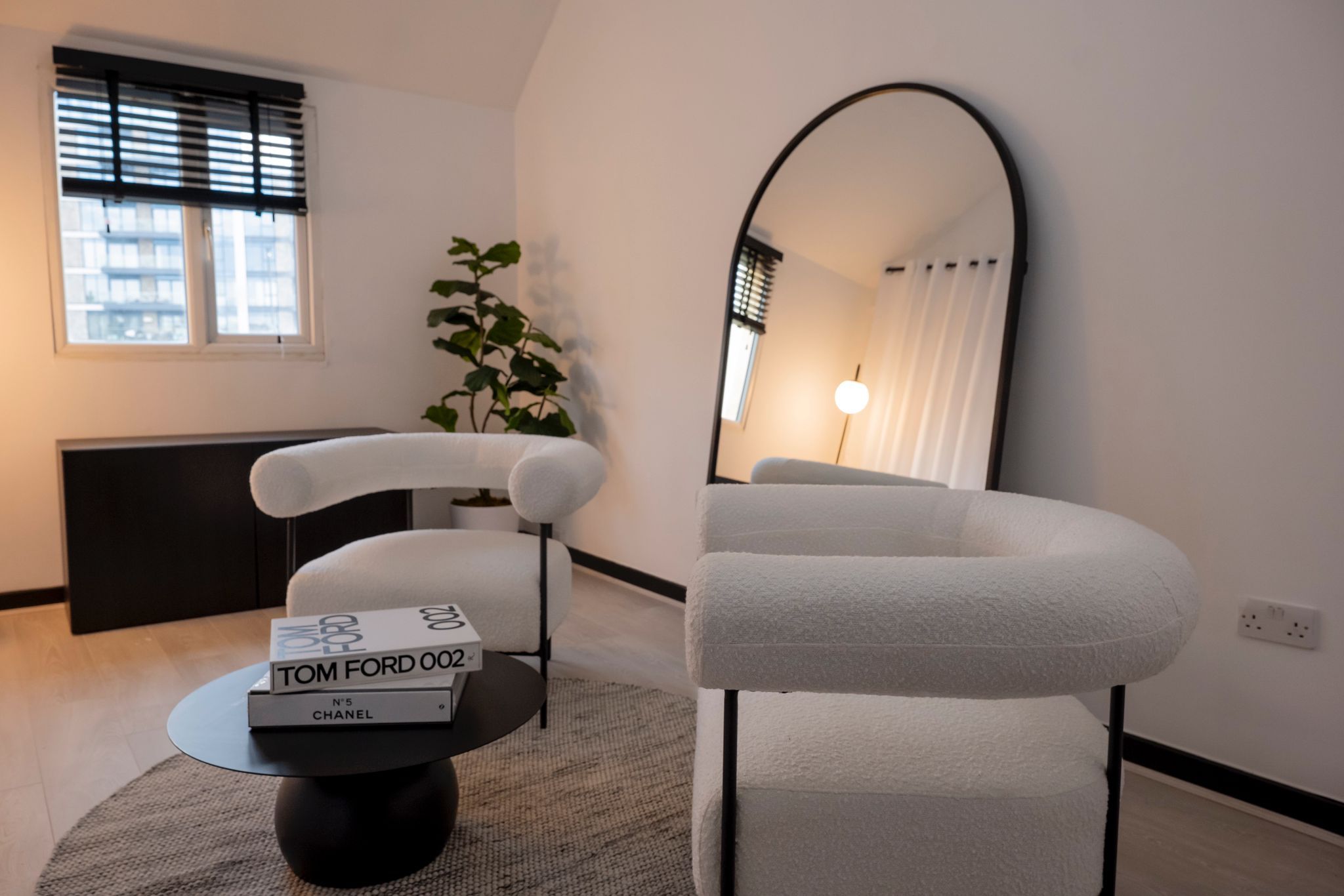 Modern meeting space at RVLT Studios with plush seating for creative workshops.