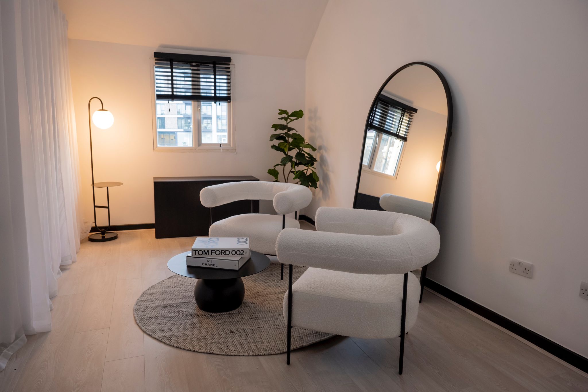 Modern meeting space at RVLT Studios with natural light for creative gatherings.