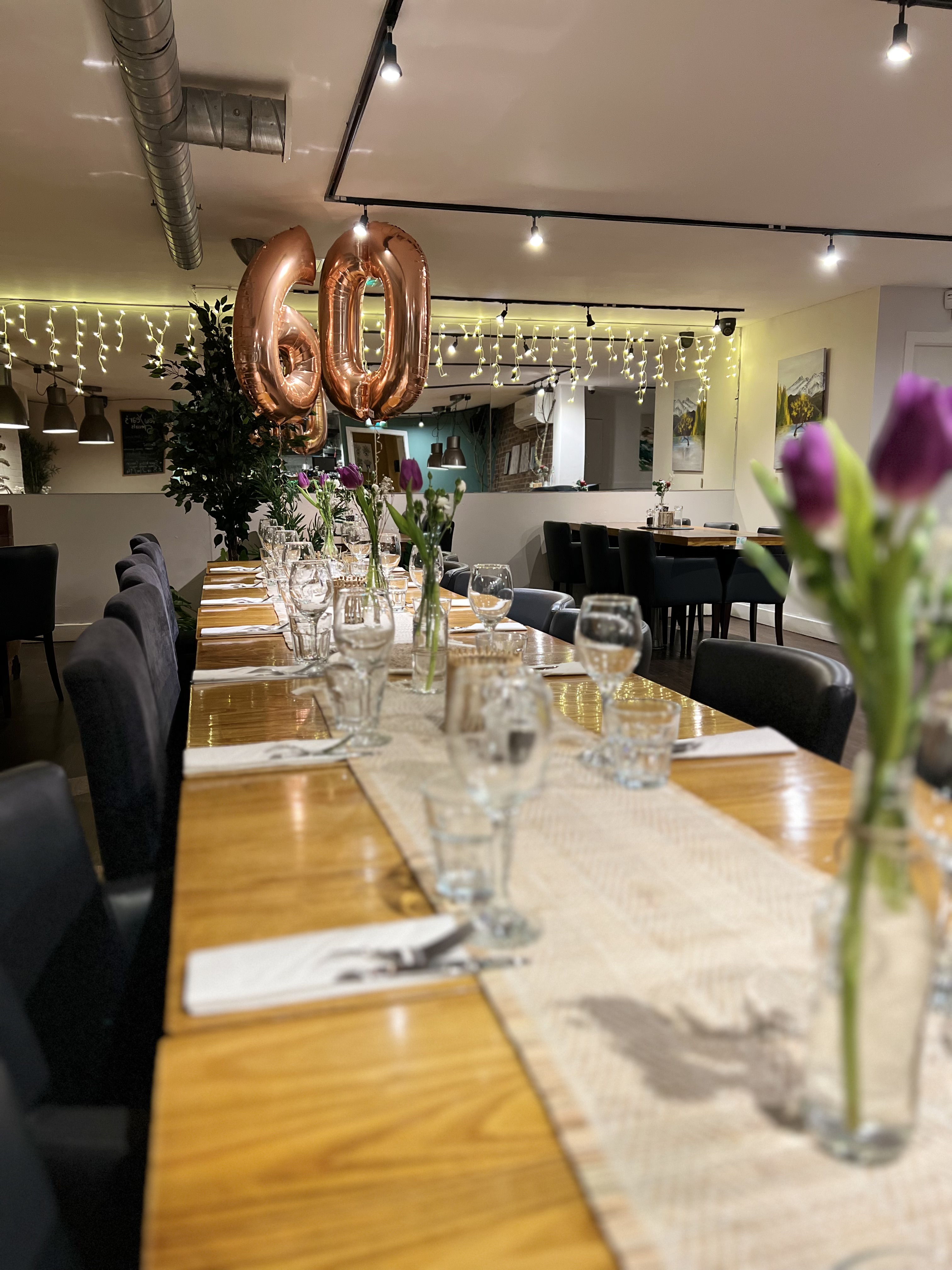 Elegant dining table at PUPA Restaurant, perfect for private dinners and gatherings.