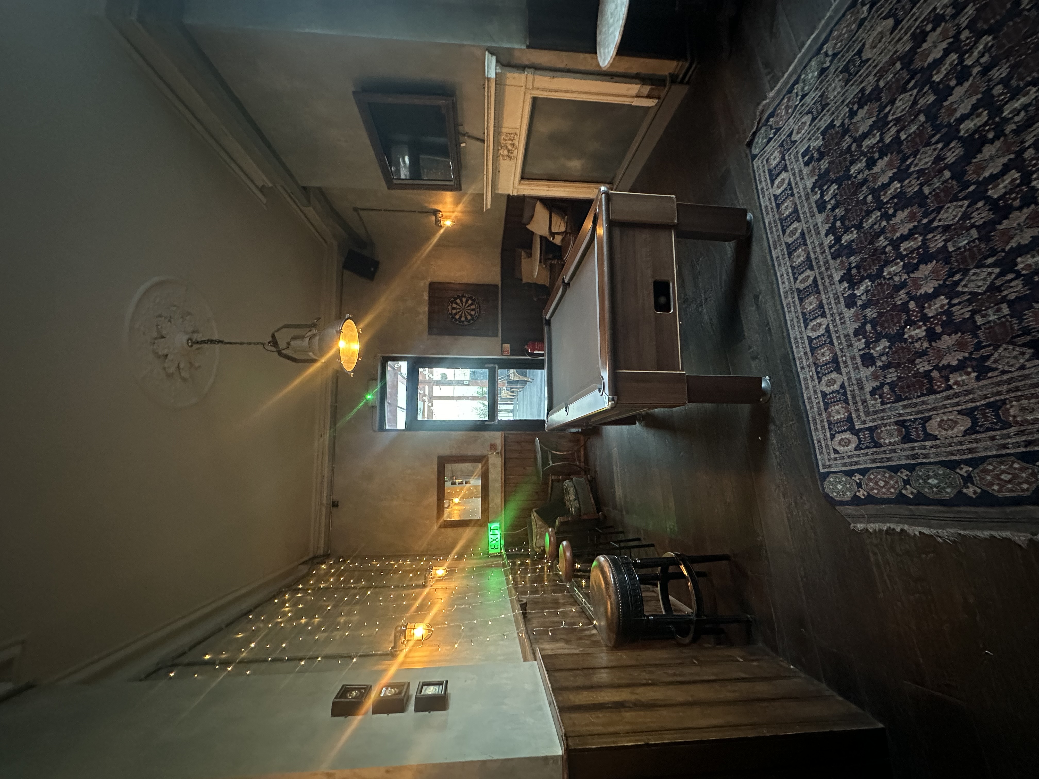 Cozy billiard room with pool table, ideal for networking and team-building events.