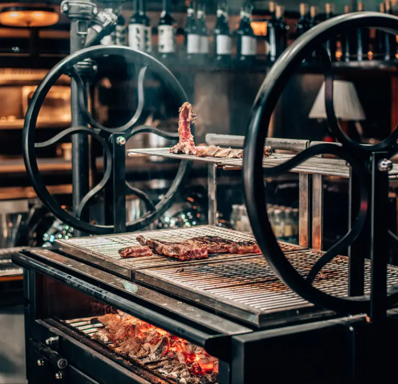 Stylish grill setup at MacellaioRC - SOHO for interactive dining events.
