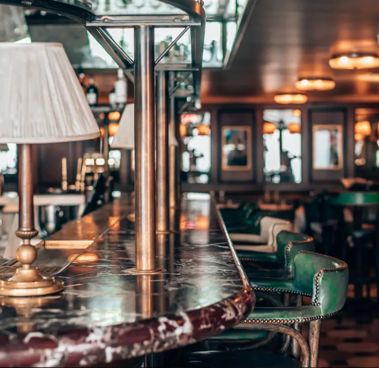 Stylish bar area in MacellaioRC - SOHO, perfect for networking events and meetings.