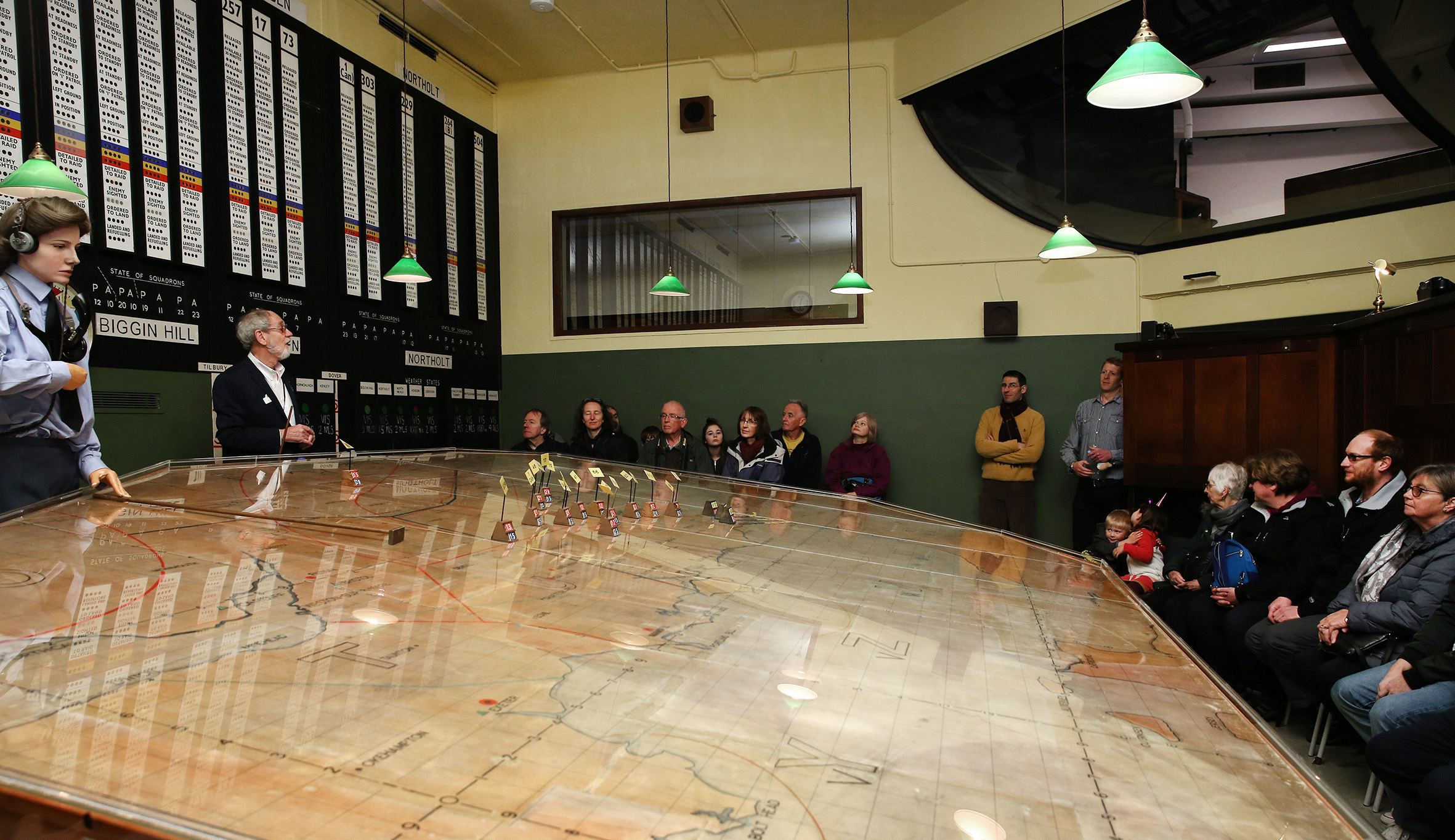 Bunker Briefing Room with attendees at a historic educational workshop presentation.