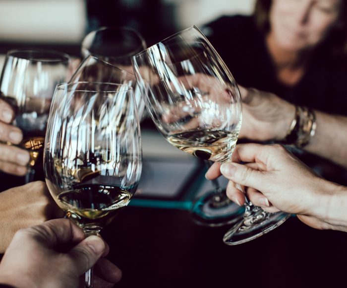Celebratory toast at House Café, Hornsey Town Hall; networking event ambiance.