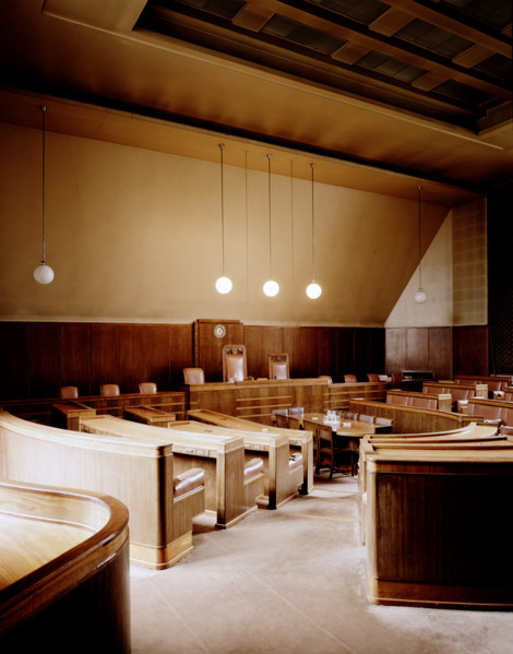 Hornsey Town Hall Council Chamber, spacious courtroom with wooden paneling for formal events.
