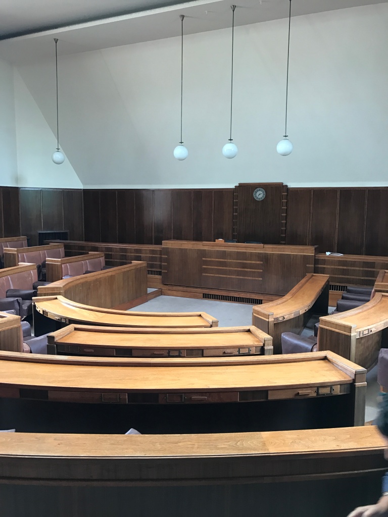 Hornsey Town Hall Council Chamber with tiered seating for legal seminars and corporate meetings.