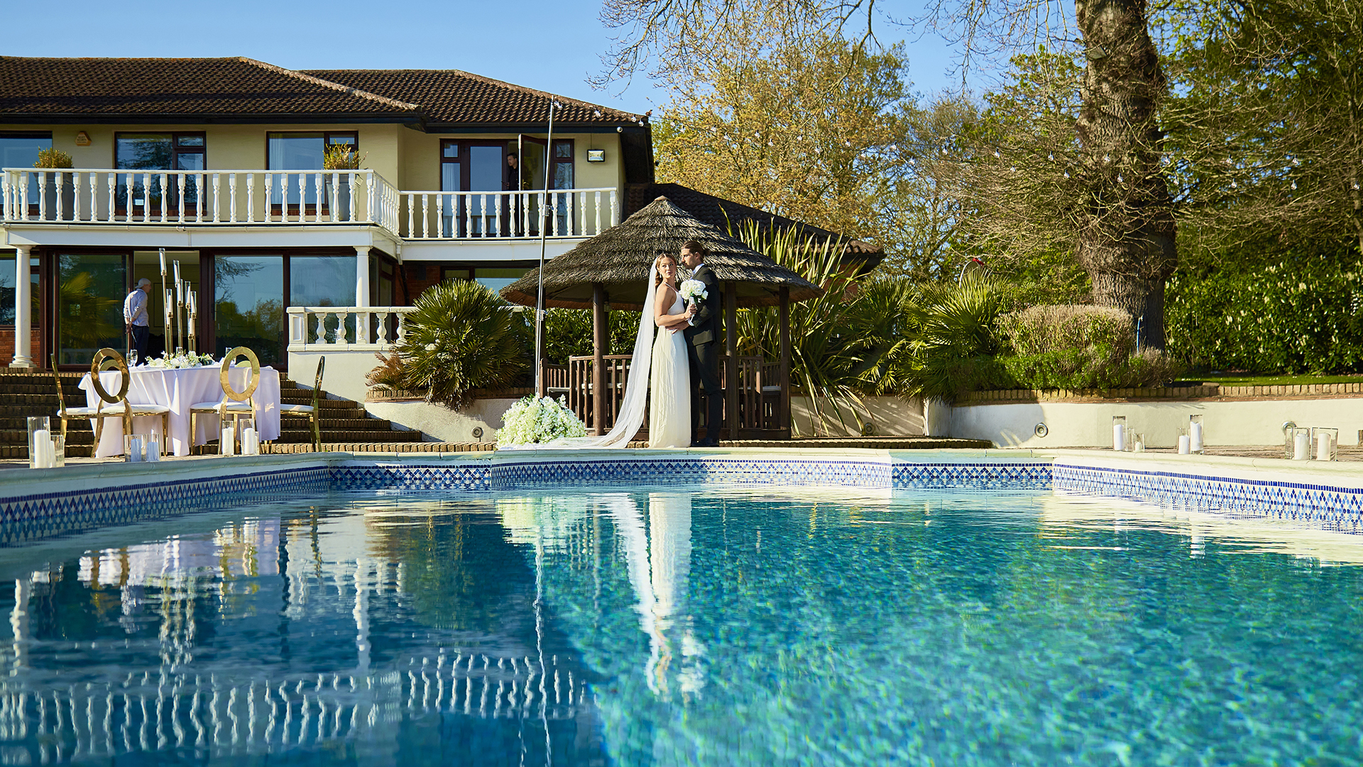 Villa Mansion outdoor venue with serene pool, ideal for weddings and events.