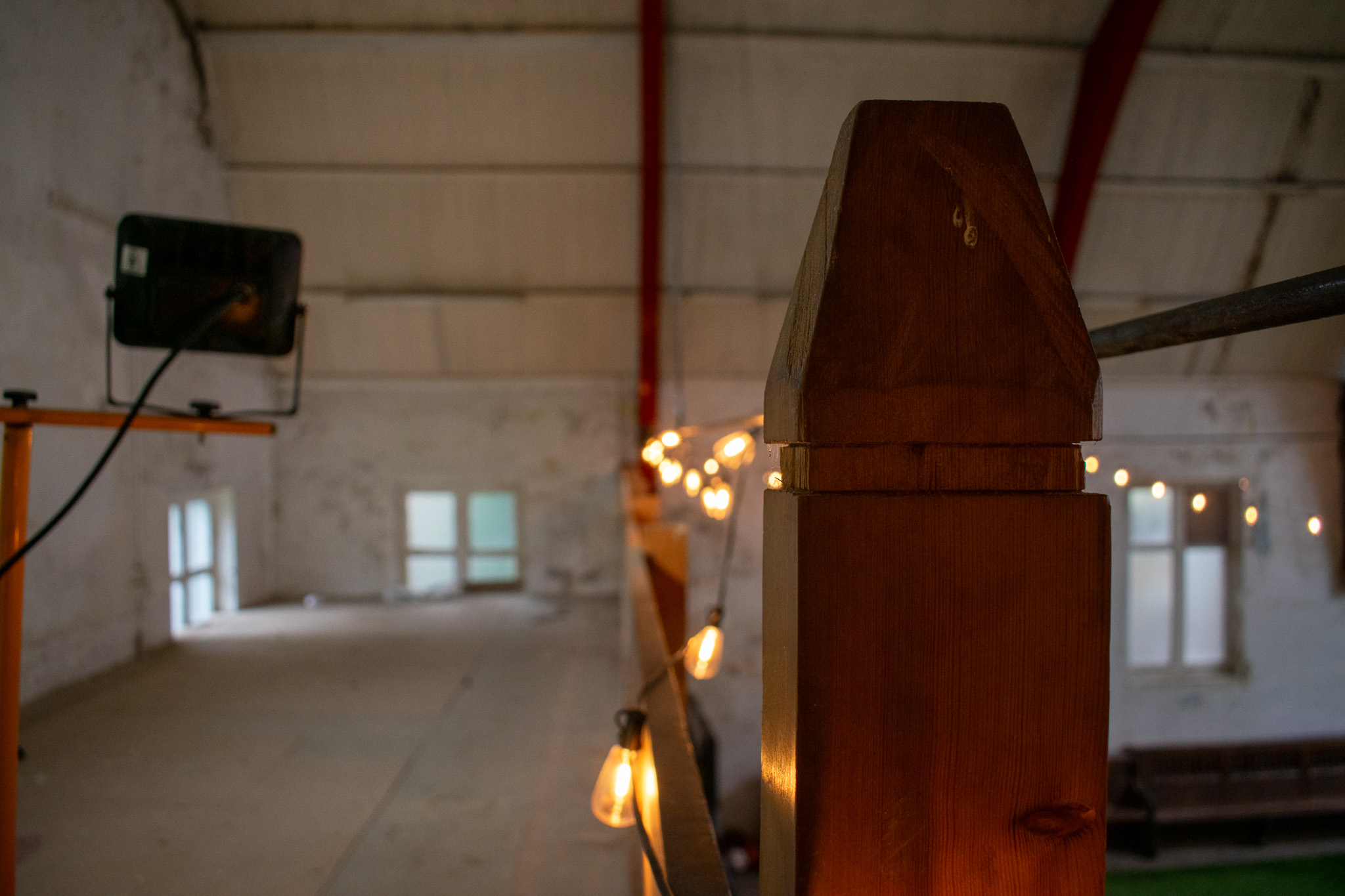 Spacious rustic ARK Studios venue with exposed beams, perfect for creative events.