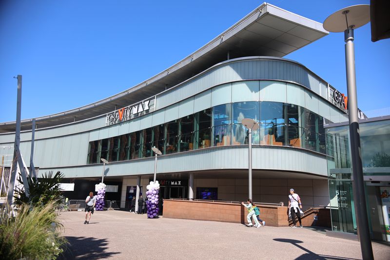 Modern meeting room with glass front, ideal for conferences and corporate events.