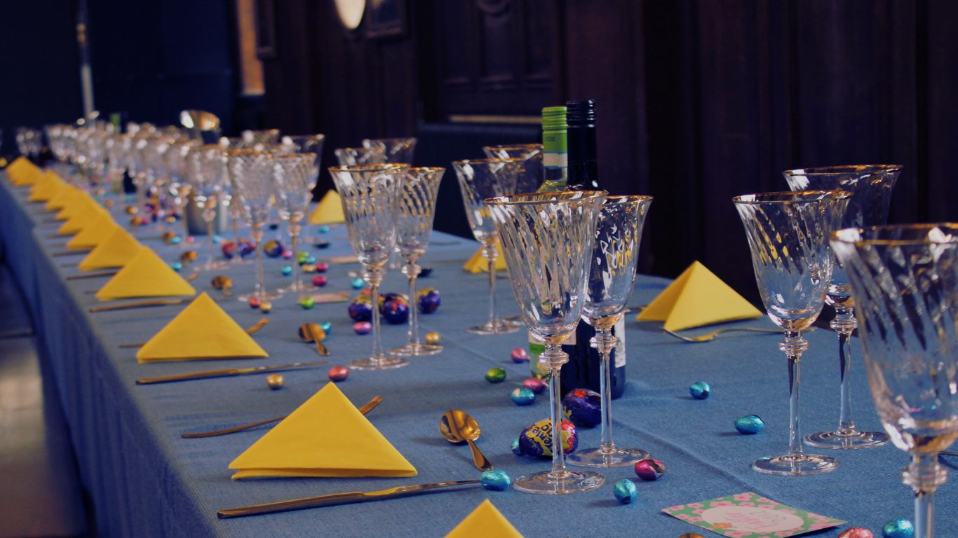 Elegant banquet table setup with crystal glassware for formal events at UCS Venues.
