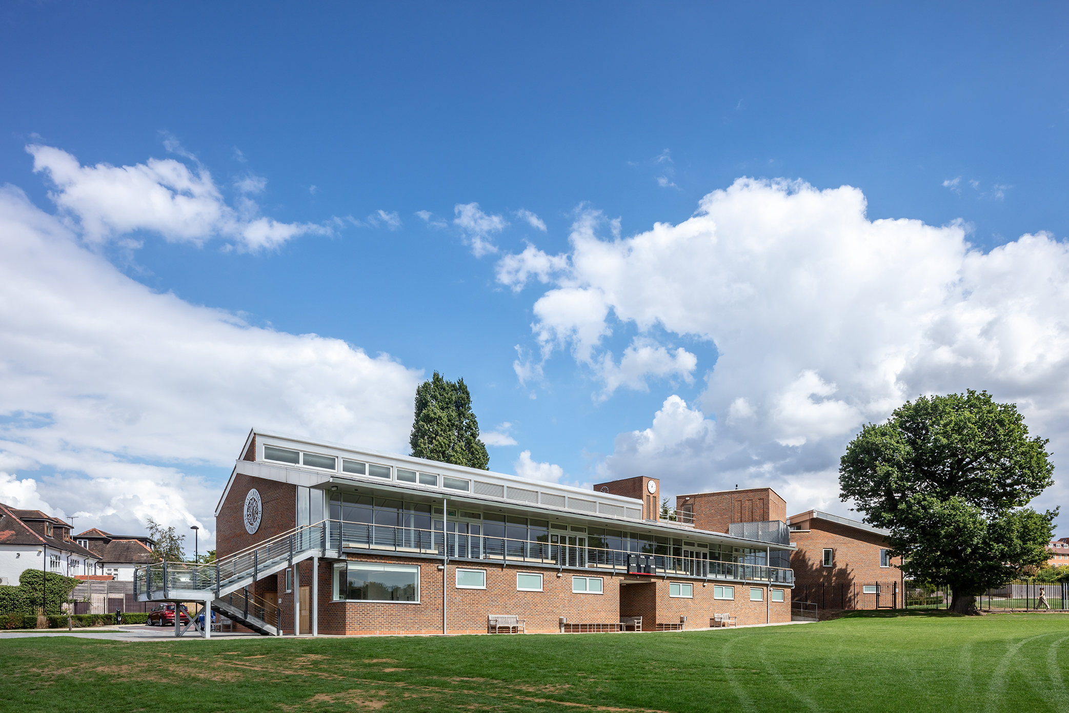 UCS New Pavilion: modern event venue with large windows, perfect for meetings and gatherings.