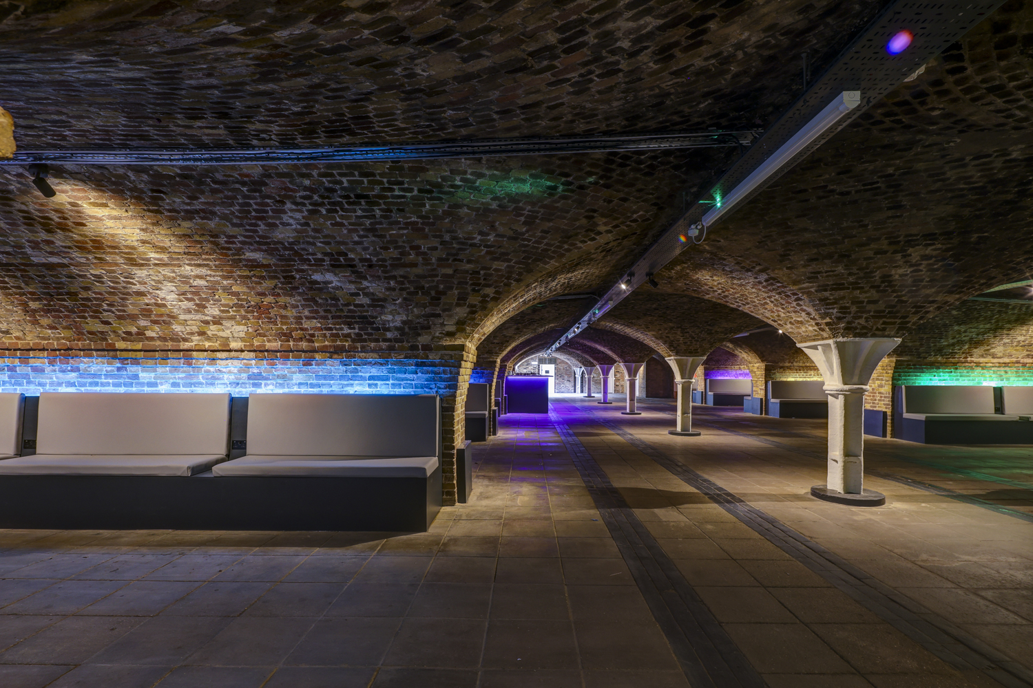 Half Venue in Dockside Vaults: unique event space with exposed brick arches for gatherings.