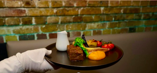 Elegant plated dish at Half Venue, Dockside Vaults for upscale corporate events.