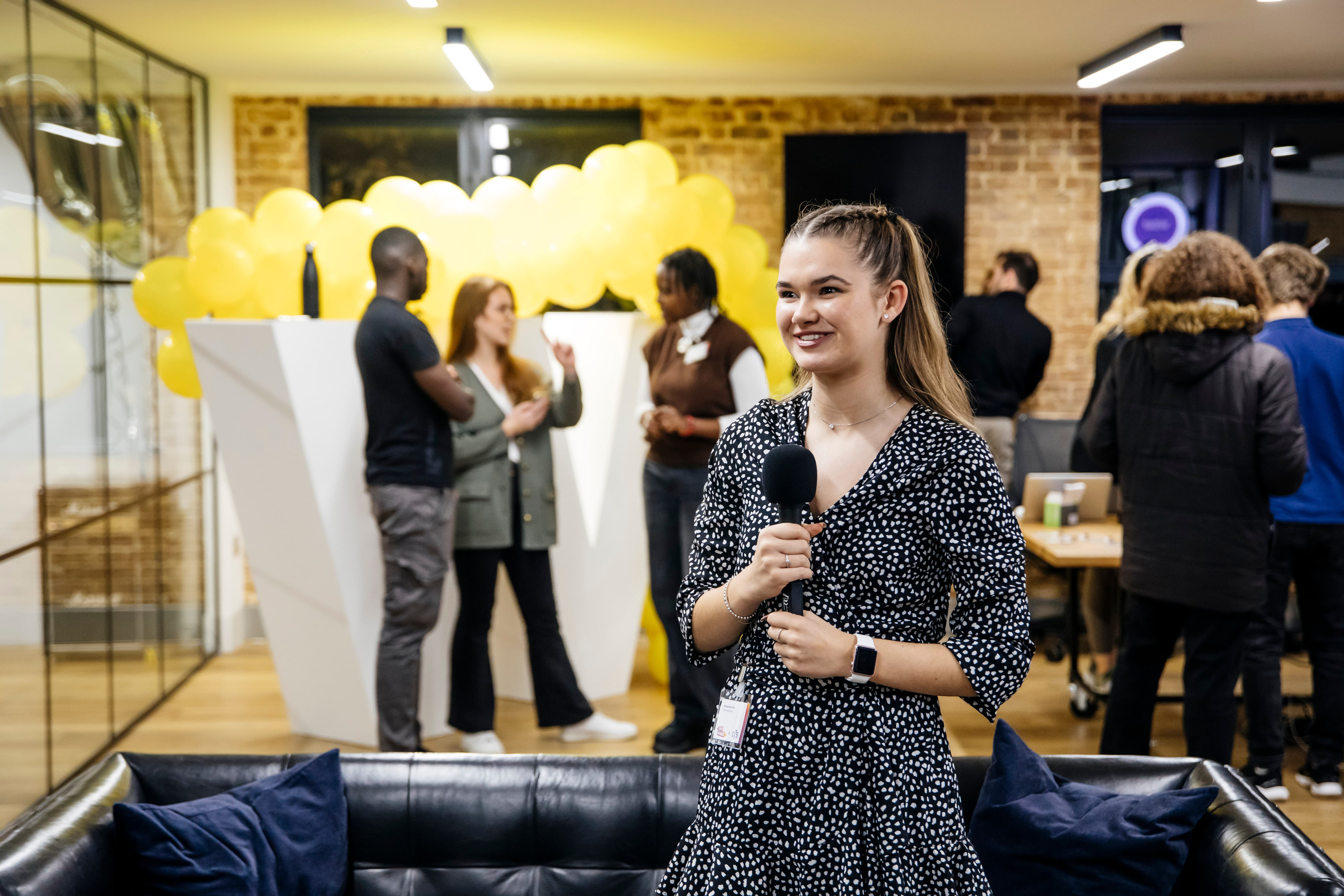 Vibrant EC1 Campus event with yellow balloons, ideal for networking and meetings.