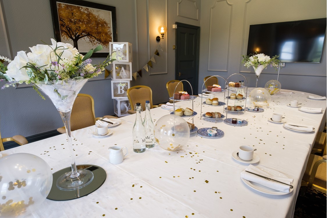 Elegant Longmoor Room at Moor Hall Hotel, ideal for corporate events and gatherings.