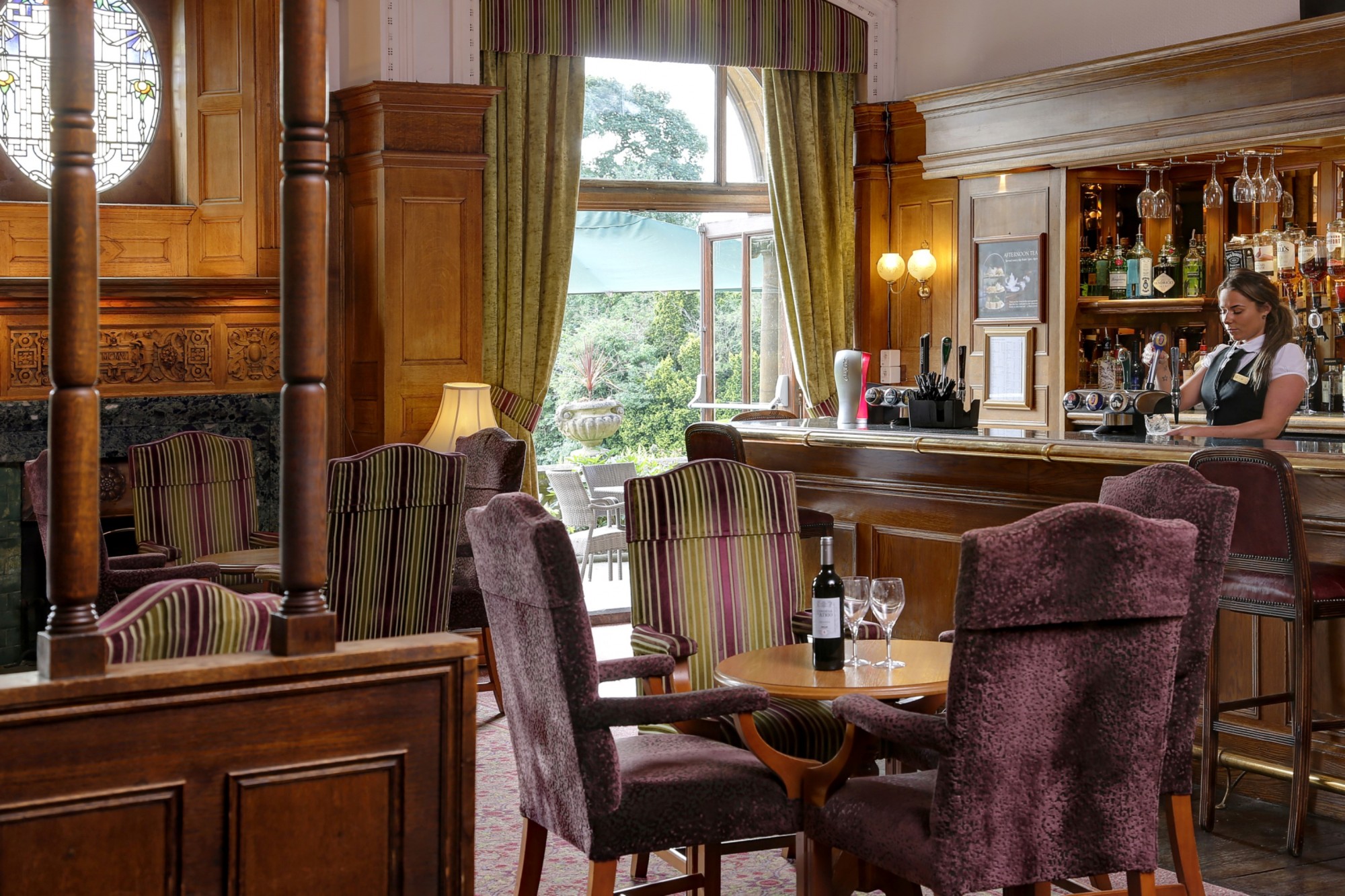 Sophisticated Longmoor Room lounge at Moor Hall Hotel, ideal for networking events.